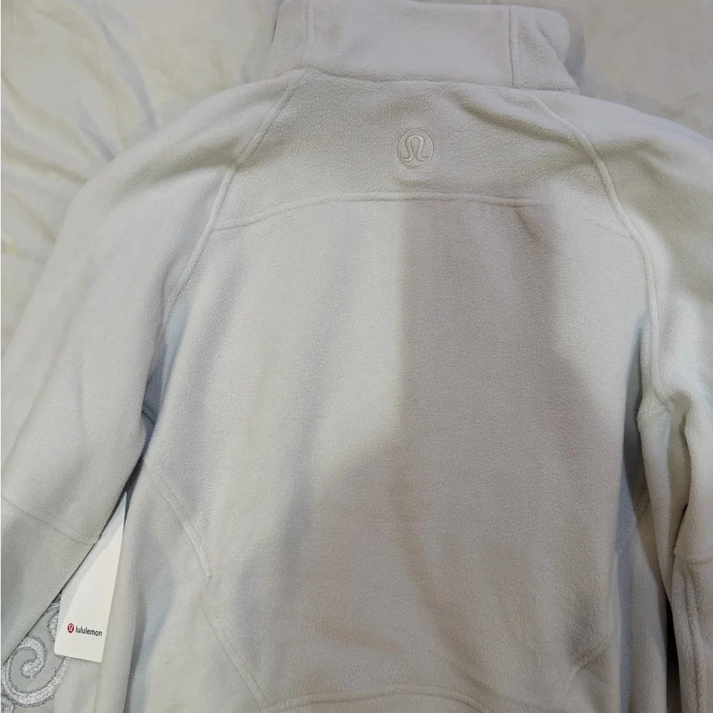 Scuba Tumbled Fleece Funnel-
Neck Half Zip
Colour Bone/Gold
Size XL/XXL - Picture 9 of 10